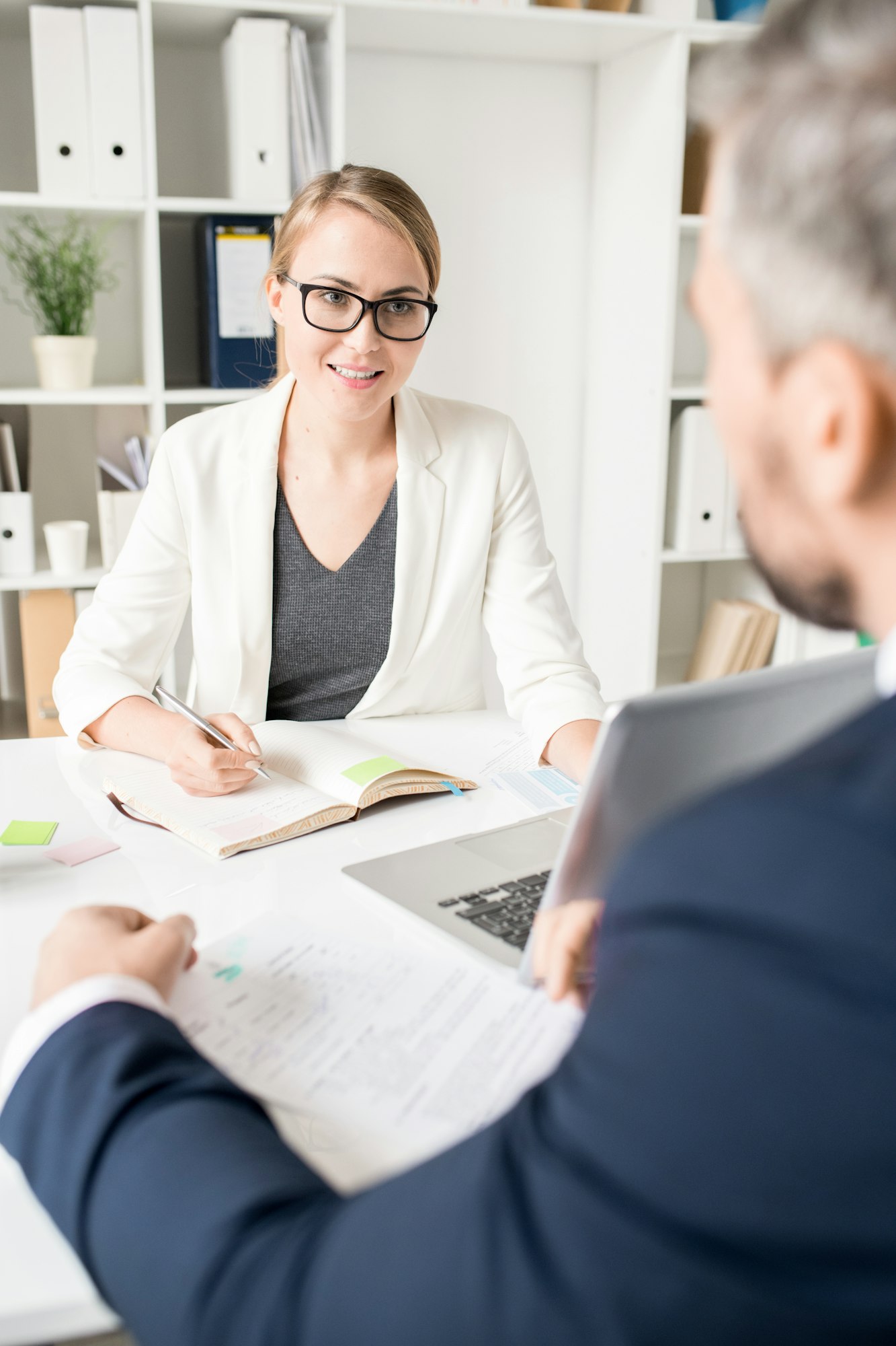 Smiling business consultant talking to entrepreneur