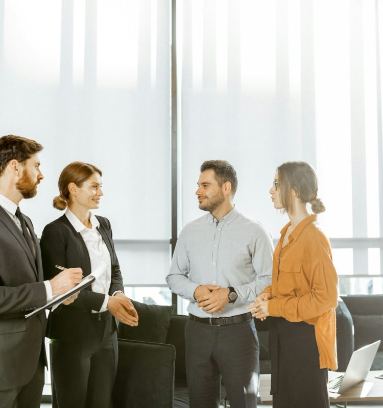 Couple with business consultants at the office